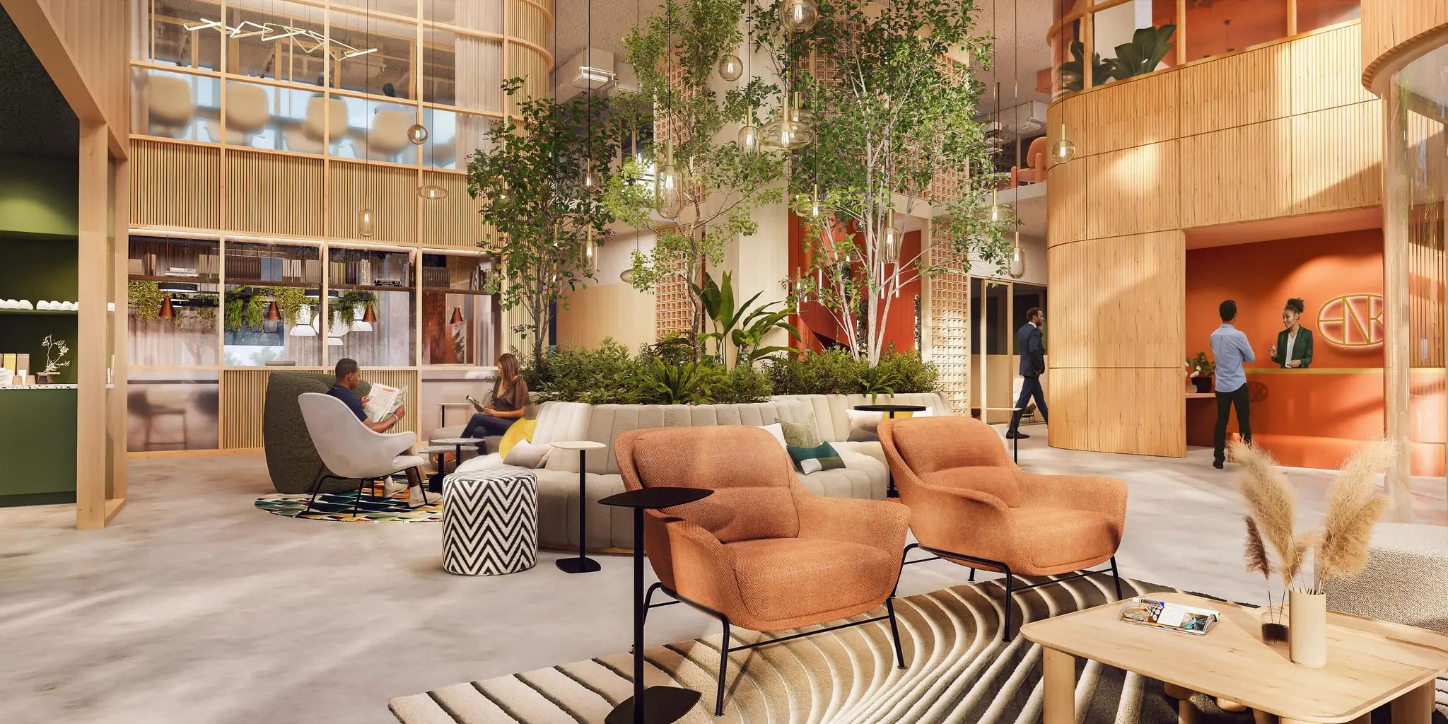 Moderne en sfeervolle lobby aan de Marten Meesweg met zithoeken, veel groen en een receptiebalie.